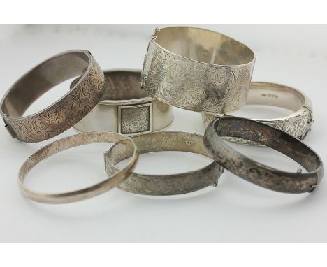 Seven various silver bangles