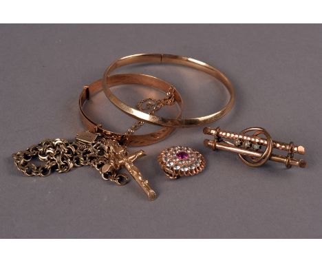 A 9ct gold bangle, together with a 9ct gold crucifix on fine link chain, approx 8.5g, a damaged yellow metal bracelet, a gem 