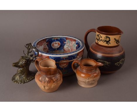 A vintage brass deer's head inkwell, together with four Doulton jugs, a Chinese porcelain planter and another item (parcel) 