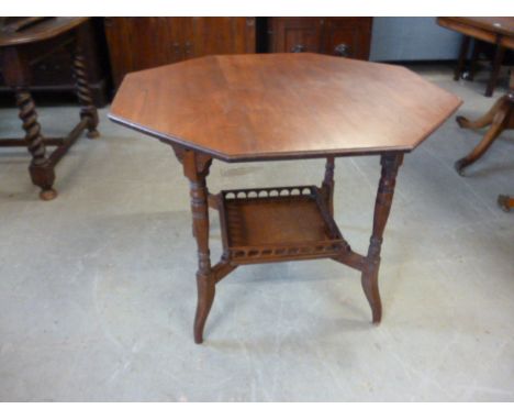 A Victorian red walnut octagonal occasional table, with galleried shelf stretcher 91 cm dia.  