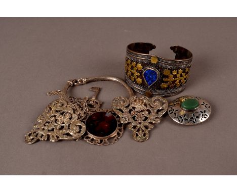 A silver and lapis cuff bangle,  the thick band with tear shaped centre, also a silver bracelet, a moss agate pendant, Mexica