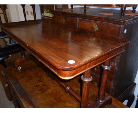 A Victorian mahogany coffee table, on twin pillar supports with turned stretcher 107 cm W 