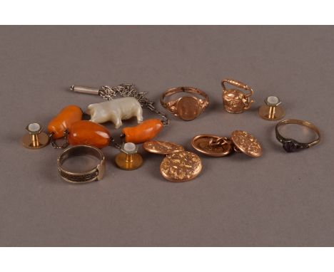 A group of gold and other jewellery items, including a pair of 10ct marked cufflinks, a 10ct marked mourning ring, a 9ct gold