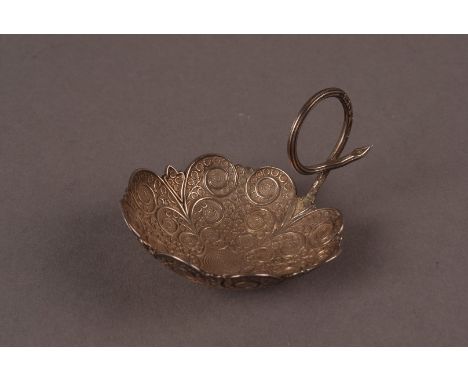 A George IV period silver tea caddy spoon, the flower head bowl with raised scroll design and having loop handles, marked to 
