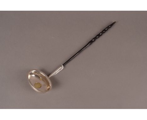 A George III silver coin set toddy ladle,  the oval bowl, inset with silver gilt Geroge II sixpence, dated 1757, with Whale b