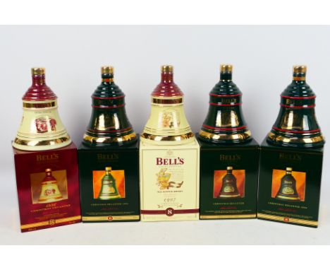 Five 70cl Bells Old Scotch Whisky Christmas Decanters comprising 1993, 1994, 1995, 1996 and 1997, 40% abv and contained in pr