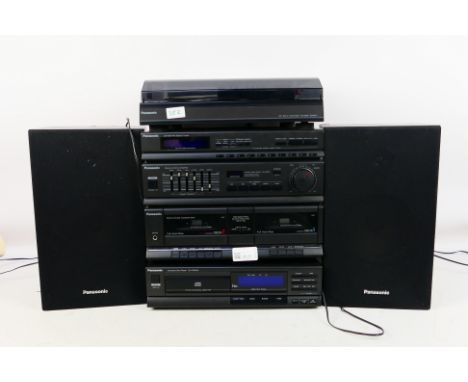 A quantity of Panasonic stereo equipment and two speakers to include a Compact Disc Player SL - PJ324A, turntable, Stereo Con