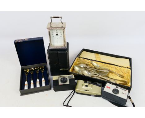 Lot to include cameras, small quantity of flatware and a carriage clock. [W]