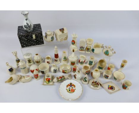 A collection of crested ware to include Goss, Shelley, Arcadian and similar, largest piece approximately 11 cm (h) and a boxe