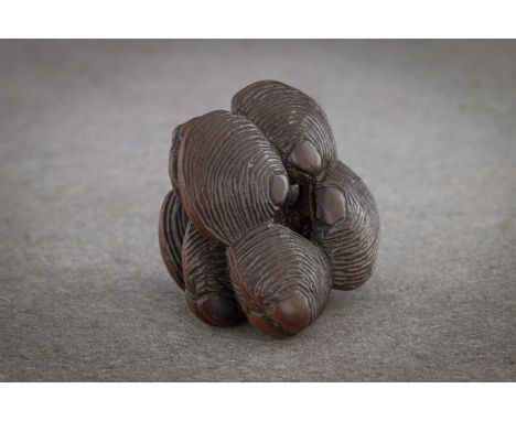 A WOOD NETSUKE OF A CLUSTER OF EIGHT HAMAGURI CLAMS Unsigned, Japan, probably 19th century Well carved as a cluster of hamagu