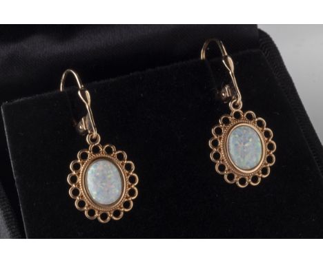 A pair of 9ct rose gold synthetic opal drop earrings approx 3.5cm long, total gross weight approx 3.4g *good condition, wear 