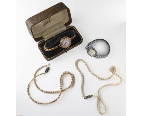 A ladies 1930s 9ct gold cased wristwatch circular mother of pearl dial, with black Arabic numerals, hallmarked Chester 1934, 