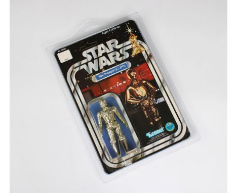 STARWARS original vintage 12 back C-3PO (See-Threepio) Unpunched and ungraded. With protective star case. *Some cracks to bub