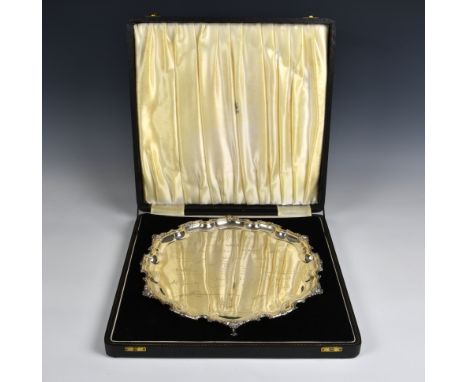 Silver presentation salver J B Chatterley &amp; Sons Ltd, Birmingham, 1970, of typical form with shell, scroll and beaded rim