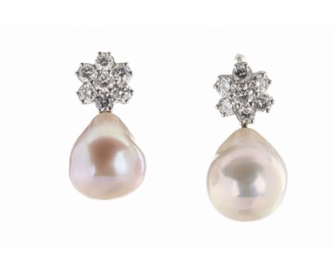 A pair of white gold diamond and South Sea pearl earrings each flowerhead cluster set with seven round brilliant cut diamonds