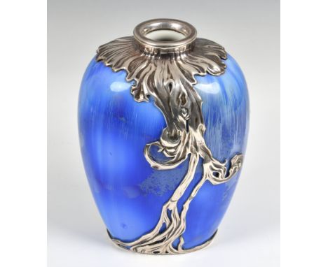 An Art Nouveau Royal Copenhagen silver-mounted ovoid vase, the blue enamelled body overlaid with sinuous silver lines, the va