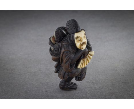 A RARE AND FINE WOOD NETSUKE OF AN OKINA DANCER Signed Shunsai, Japan, late 19th century, Meiji period (1868-1912) The wood n