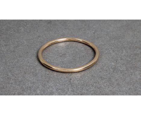 A 15ct yellow gold solid bangle. *weight 45g.