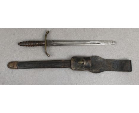 A WWI Italian trench knife made from an 1891 bayonet the 11 3/8in. steel blade, rounded off at tip, brass cross guard, turned