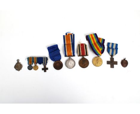 A Royal Guernsey Light Infantry WAR medal awarded to 2067 PTE . J. JAMOURNEAUX., together with various other medals to includ