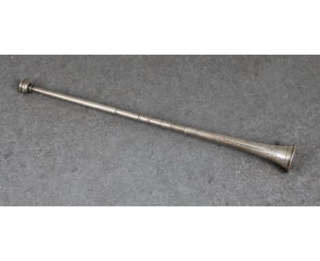 A silver miniature hunting horn maker's mark indistinct, Chester, 1908, engraved initials, 12in. (30.5cm.) long, weight 1.45 