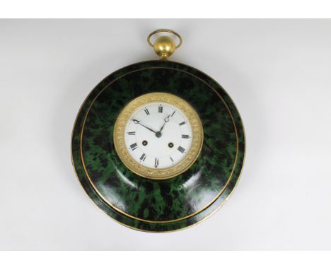 A mid 19th century tole painted wall clock in the form of a pocket watch white enamel dial with Roman numerals, gilt metal be