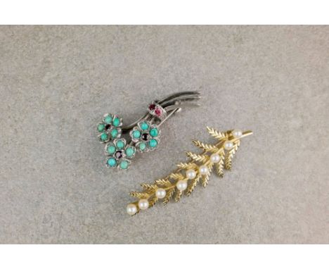 A 9ct gold and seed pearl brooch of foliate form, together with a white metal, floral spray brooch with turquoise detailing t
