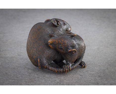 A WOOD NETSUKE OF A PAIR OF RATS WITH ENTWINED TAILS Unsigned, probably mid to late 19th century The rats with beady eyes are