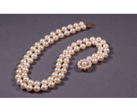 A two row pearl necklet with a 9ct gold and diamond clasp.