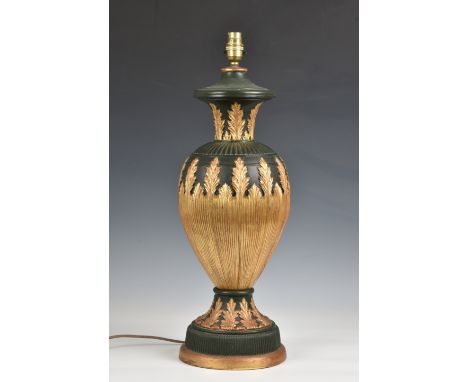 A ceramic gilt and dark green vase lamp