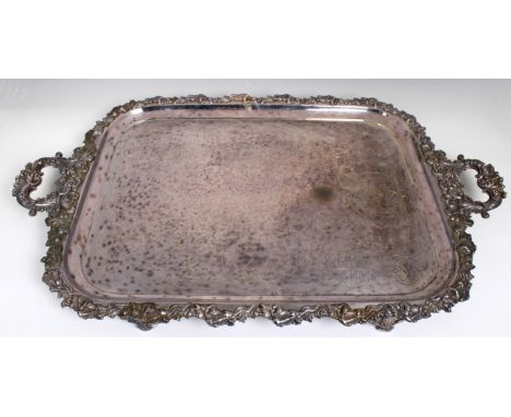 A late 19th century silver plated two handled rectangular tray engraved scrolling decoration, applied foliate edges and handl