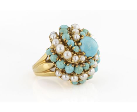 An 18ct turquoise and pearl bombe cocktail ring set with a circular cabochon turquoise approx 9mm diam, surrounded by radial 