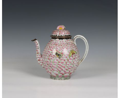 A Japanese teapot and cover in the famille rose palette unmarked, 1930's, having butterflies against a pink and green floral 