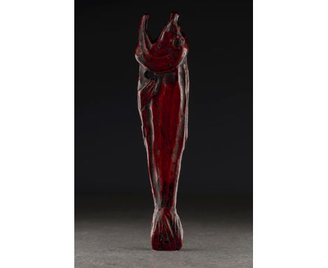 A LARGE WOOD NETSUKE OF A DRIED FISH IN RED Unsigned, probably Japan,19th century naturalistically carved as a dried fish (hi