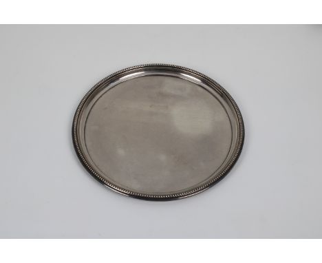 A modern silver circular tray Barker Ellis Silver Co, Birmingham, 1974, beaded rim, plain form, 10in. (25½cm.), weight 14.4 t