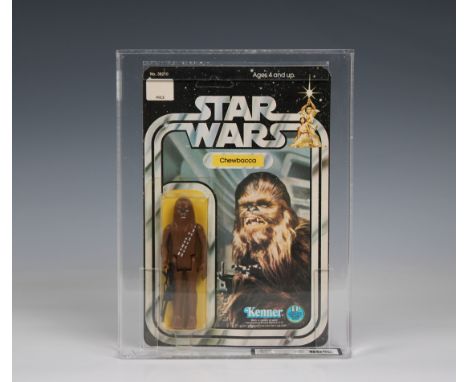 STARWARS vintage graded 12 back Chewbacca sealed in an acrylic case and graded by UKG. card 65, bubble 75, figure 85 over all