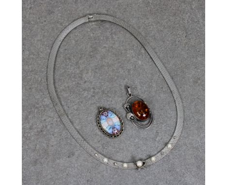 A silver flat woven necklace set with applied bow and pendant pearl flanked by alternate marcasite and seed pearls, 16½in. (4