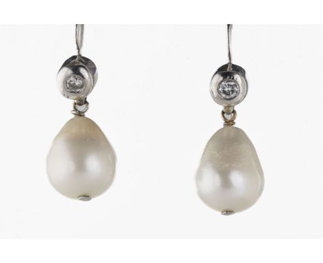 A pair of white metal pearl and diamond drop earrings the pear shaped pearls approx 10mm x 13mm, suspended from round brillia