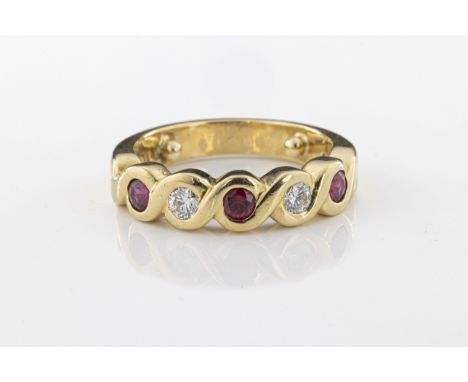 Catherine Best of Guernsey - an 18ct yellow gold ruby and diamond half eternity ring with three round cut rubies, approx 0.69