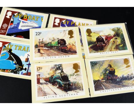 Stamps Train,  a collection of train themed item including two folders of commemorative covers and PHQ cards; together with a