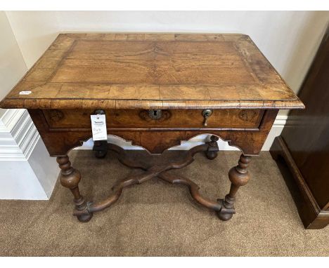 An Early 18th Century Burr Walnut, Crossbanded and Featherbanded Side Table, the quarter-veneered oak top above an oak-lined 