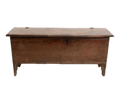 A Charles II Oak Chest, late 17th century, of nailed construction, the boarded and hinged lid enclosing a vacant interior, wi