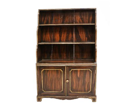 A Regency Faux Coromandel, Painted and Parcel-Gilt Dwarf Waterfall Bookcase, early 19th century, with two shelves above two m