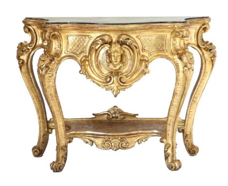 A 20th Century Giltwood and Gesso Serpentine-Shaped Console Table, in Louis XV style, the green marble top within a serpentin