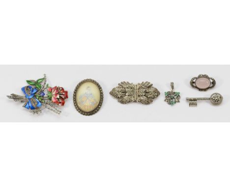 Two 925 silver gemset brooches, largest 40mm, a 925 silver marcasite pendant, three silver marcasite brooches, and a sterling