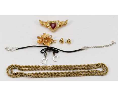 Christian Dior, a gilt metal twisted rope chain, 40cm, a pair of Christian Dior logo earrings with scroll backs, a Christian 