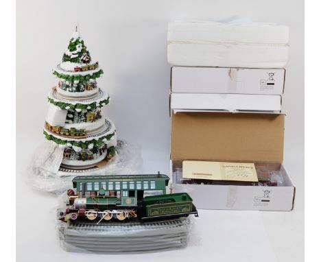 Bradford Exchange; Model railway set 'Christmas Cheer' by Thomas Kinkade to include loco & tender, seven coaches and a quanti