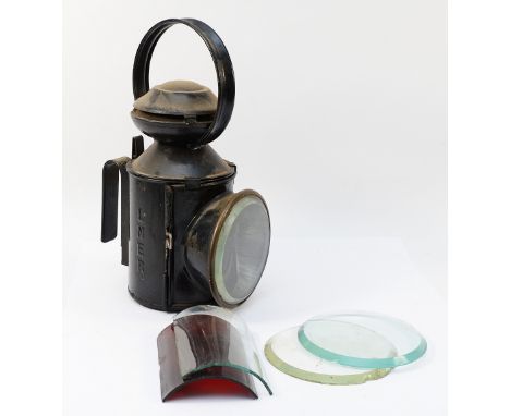 A LNER railway lamp, two aspect with oil burner, and two spare lenses.