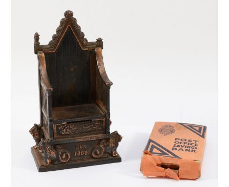 A cast iron money box, in the form of a 1953 Coronation Throne, stamped to rear 'Harper' 21cm tall, together with a post offi