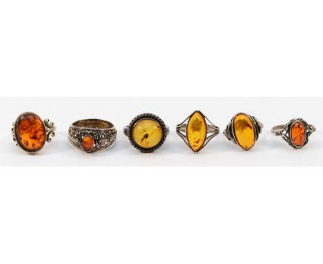 Four 925 silver and amber rings, J-O, with two unmarked silver and amber rings, M-P, 20g